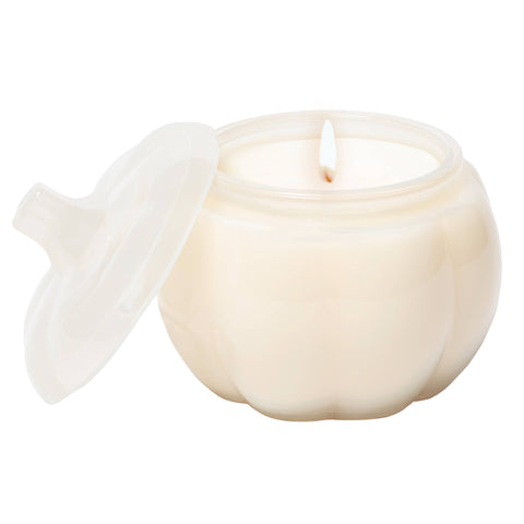 White ceramic container with a lid and a candle inside on a white background