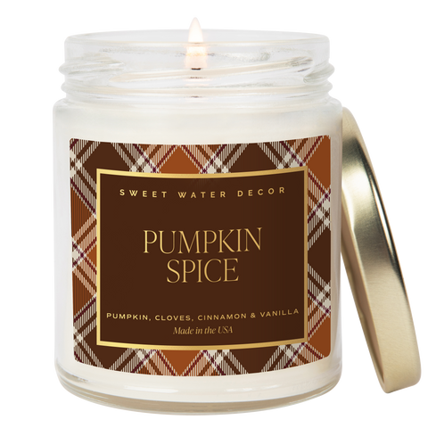 Candle in a jar with a 'Pumpkin Spice' label on a white background