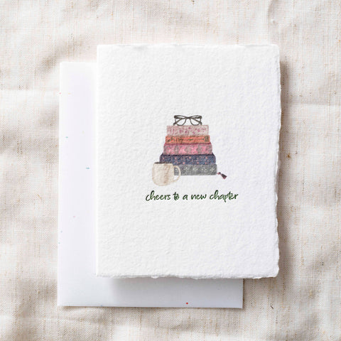 Cheers to a new chapter | Book Graduation Greeting Card Front - Paper Baristas