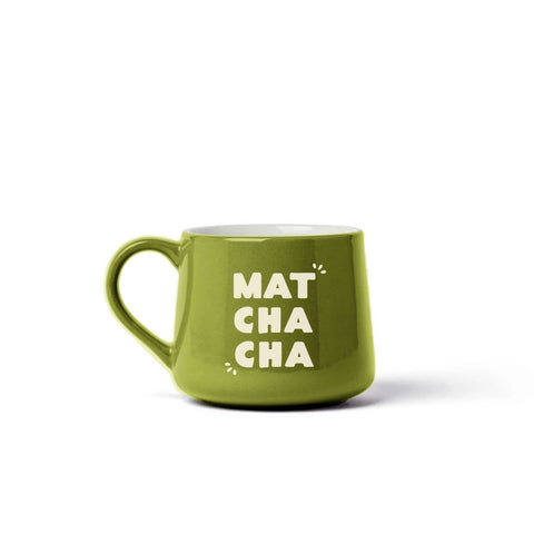 A bright green ceramic mug with the words 'MAT CHA CHA' printed in white on the front, set against a plain white background.