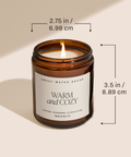 Candle in a brown jar with dimensions labeled on a beige background