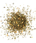 Dry green tea leaves on a white background