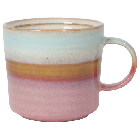 Multicolored ceramic mug with a gradient from blue to pink on a white background