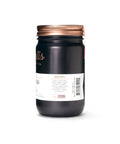 Black jar with a copper lid on a white background