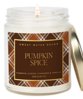 Candle in a jar with a 'Pumpkin Spice' label on a white background