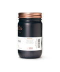 Black jar with a copper lid on a white background