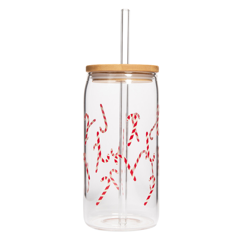 Clear glass tumbler with red candy cane design, wooden lid, and straw on a white background