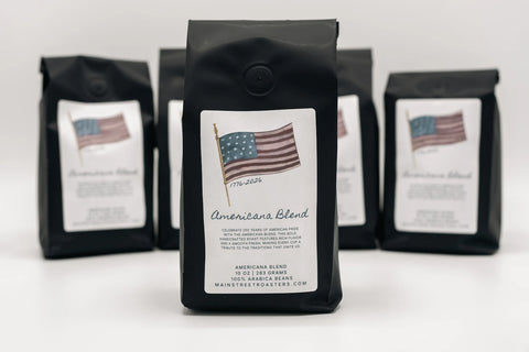 Coffee bags labeled 'Americana Blend' with American flag design on a white background