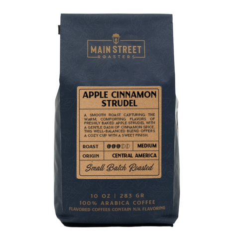 A 10 oz bag of Main Street Roasters Apple Cinnamon Strudel coffee, featuring a dark navy blue bag with a tan label on a white background.