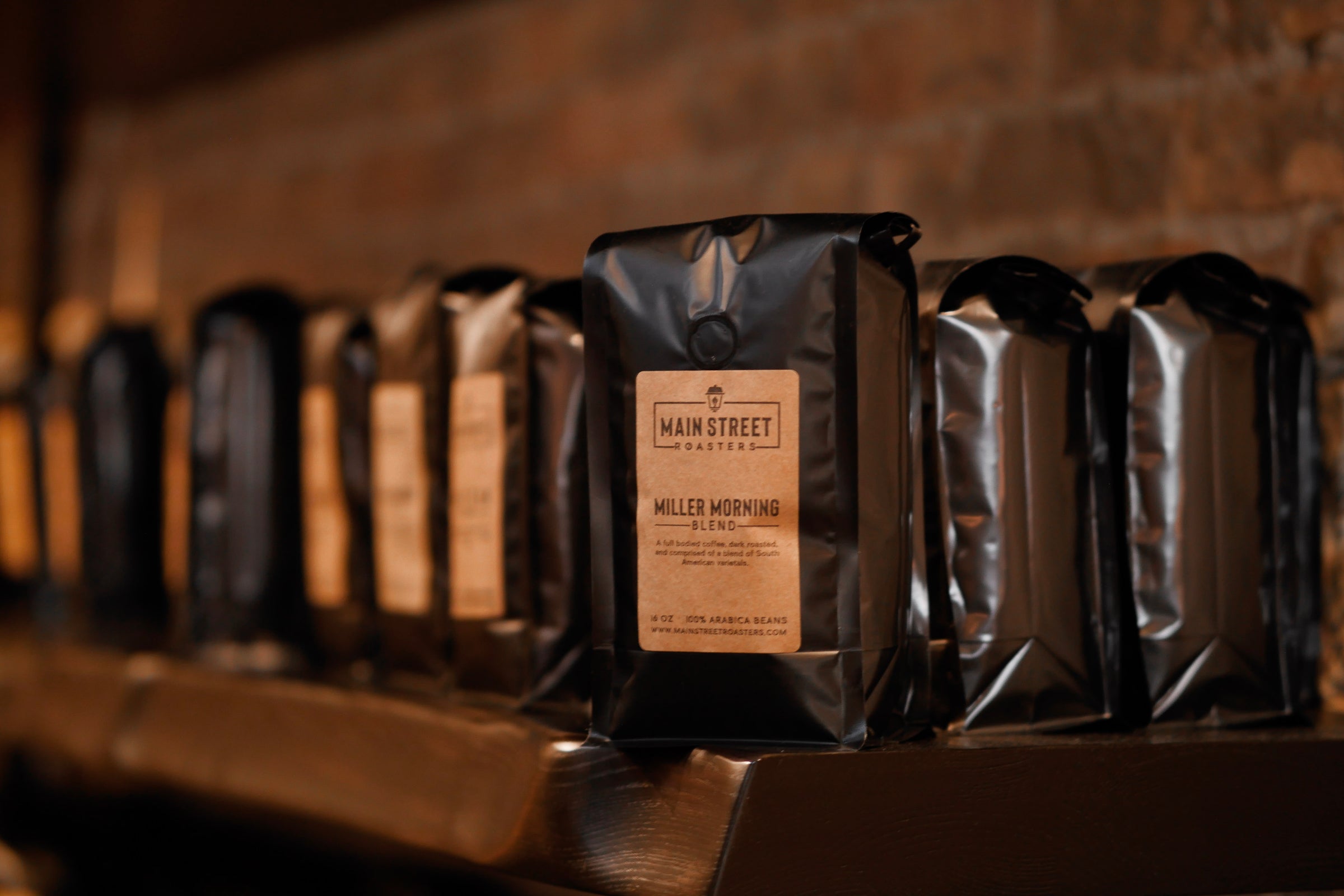 Bags of Coffee Beans in Retail Area - Main Street Roasters