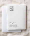 Cheers to a new chapter | Book Graduation Greeting Card Back - Paper Baristas