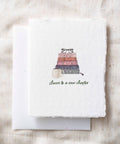 Cheers to a new chapter | Book Graduation Greeting Card Front - Paper Baristas