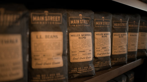 Row of Main Street Roasters coffee bags on a shelf