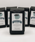 Five black coffee bags labeled 'Father's Day Blend' on a white background