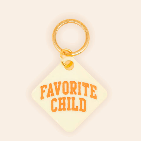 Tag with 'Favorite Child' text on a beige background
