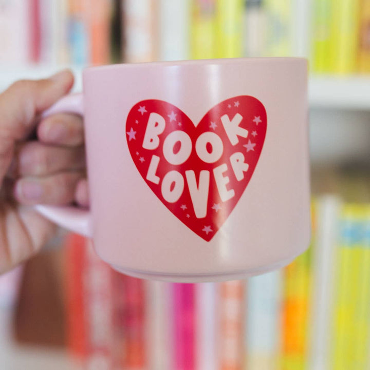 Pink Book Lover Ceramic Mug In Hand