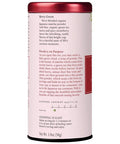 Tea canister with red and white design on a white background