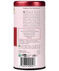 Tea canister with red lid and white label on a white background
