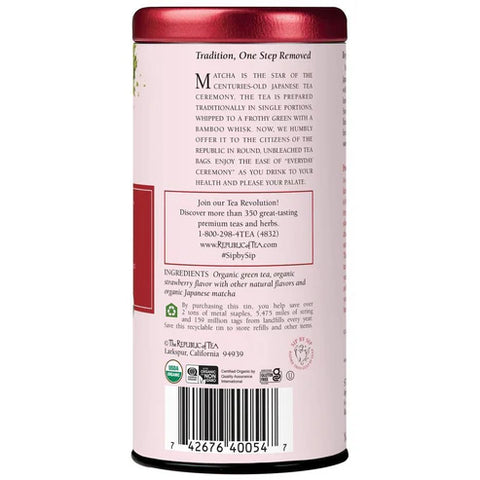Tea canister with red lid and white label on a white background