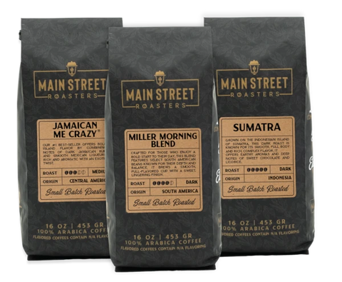 Three bags of Main Street Roasters coffee with different blends on a transparent background