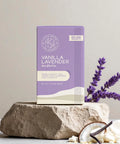 Little Prayer Tea Company Vanilla Lavender tea package on a stone surface with lavender flowers and a vanilla bean.