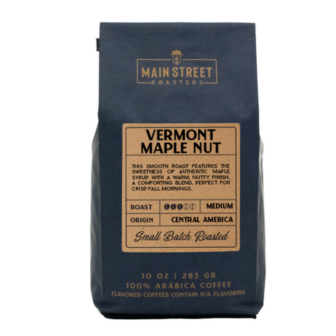 A 10 oz bag of Main Street Roasters Vermont Maple Nut flavored coffee, featuring a dark navy blue bag with a tan label on a white background.
