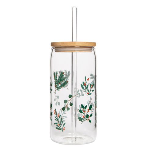 Clear glass tumbler with wooden lid and festive leaf pattern on a white background