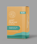 Little Prayer Tea Company Tea box labeled 'Just Peachy' on a gray background