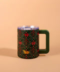 Floral-patterned mug with a handle on a beige background