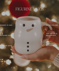 Snowman mug held by a hand with festive background